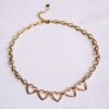 Ketting met gekoppelde hartjes – goud, foto 2
