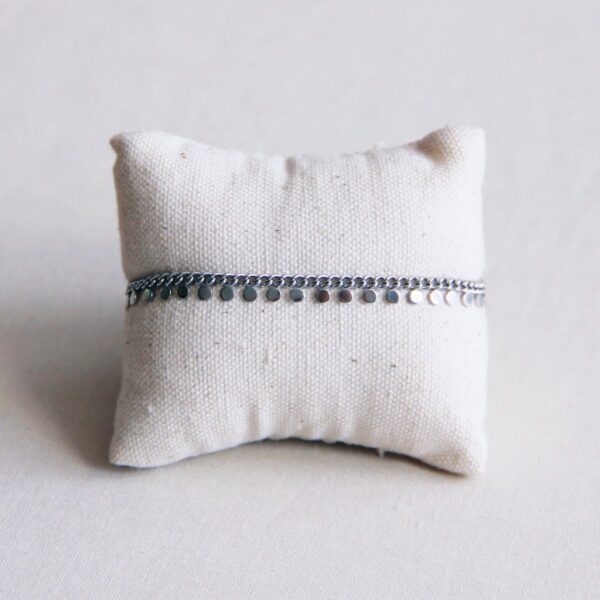 Schakelarmband met muntjes in zilver