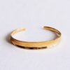 Gouden armband dames – Bangle breed uitlopend – goud