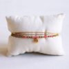 Drievoudige armband met hart en facetten – koraal – foto 2