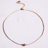 Fijne slangenketting met hartje en kraaltjes in goud