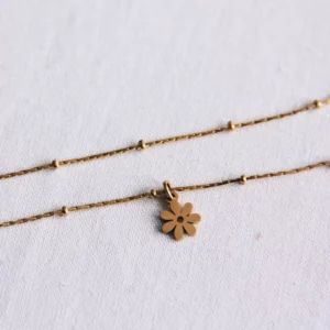 Fijn enkelbandje met madeliefjebloem – goud
