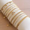 Schakelarmband met balletjes – goud – foto 3