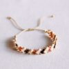 Gevlochten Tila-armband in nude tinten