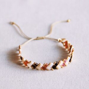 Gevlochten Tila-armband – nude tinten
