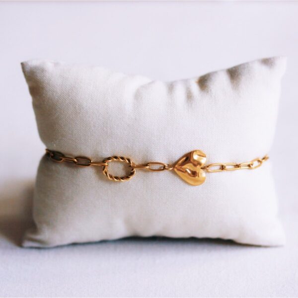 D-kettingarmband met hart en gedraaide bedel in goud