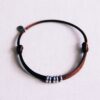 Satijnen armband met ringen in donkerbruin en zilver