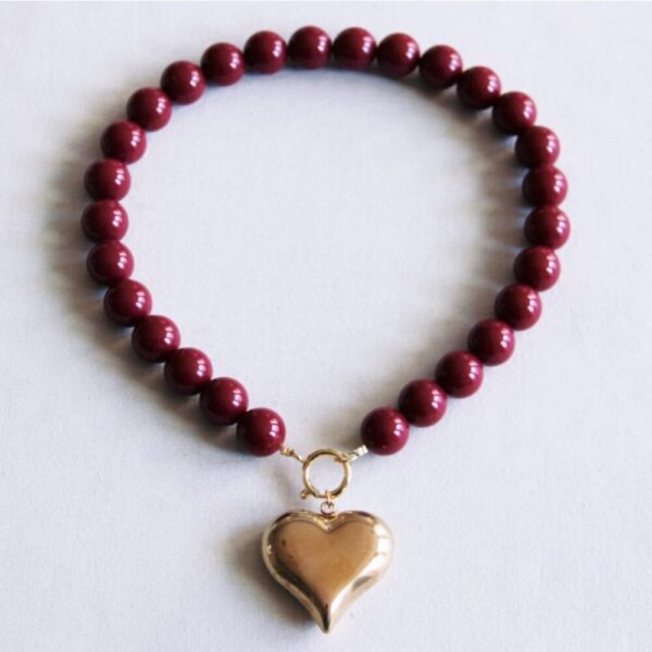 Kralenketting XXL met hartbedel in cerise