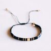 Tila-armband in zwart, antraciet en verguld