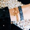 Dubbele schakelarmband met open hart – goud – foto 2