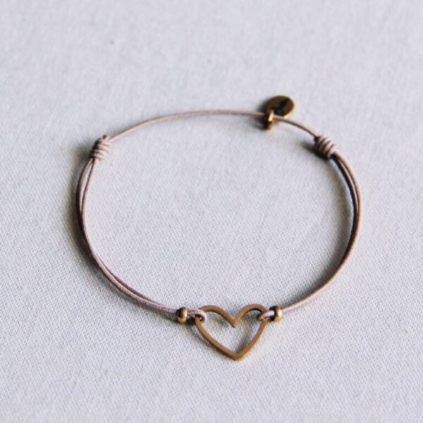 Elastische armband met open hart in taupe en goud