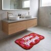 Badmat Hello Gorgeous roze/rood van House Vitamin