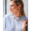 Lange kralenketting met parels en madeliefjebloemen – foto 2