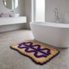 Badmat Life Flow lichtroze/blauw/geel van House Vitamin