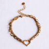 Dubbele schakelarmband met open hart in goud
