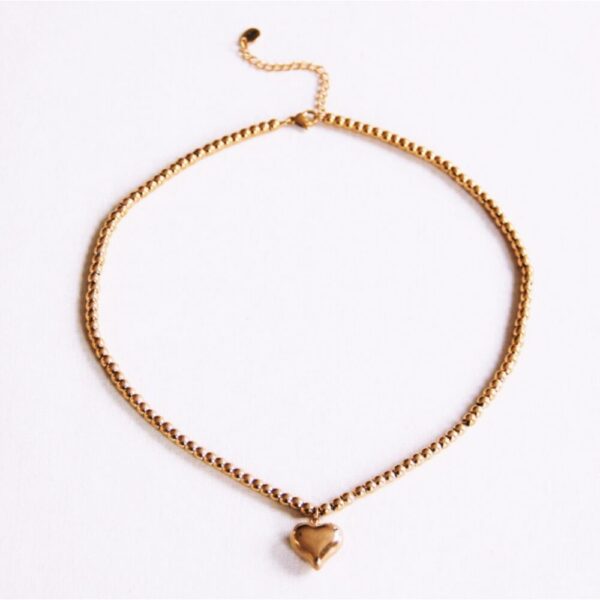 Kralenketting met hart in goud