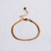 Armband platte slang in goud